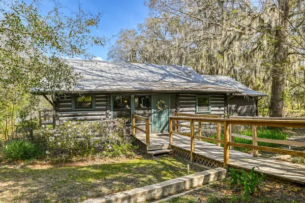 a view of a balcony with wooden floor