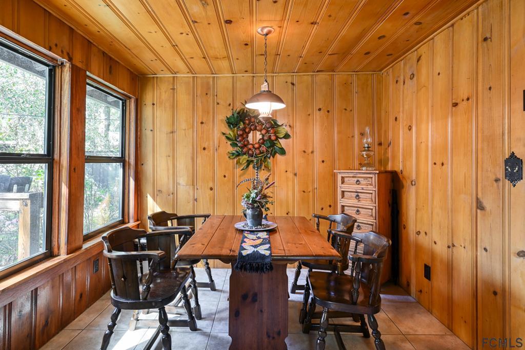 375-397 Southeast County Road Starke, FL 32091 - Photo 56 of 75 a view of a dining room with furniture window and outside view