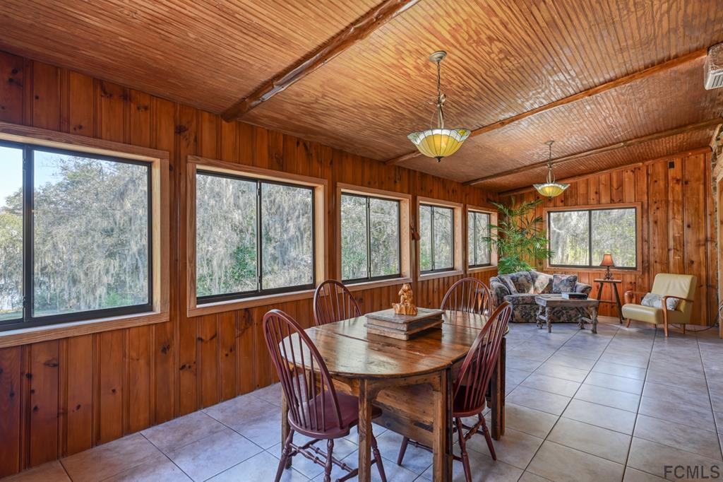375-397 Southeast County Road Starke, FL 32091 - Photo 62 of 75 a view of a dining room with furniture window and outside view