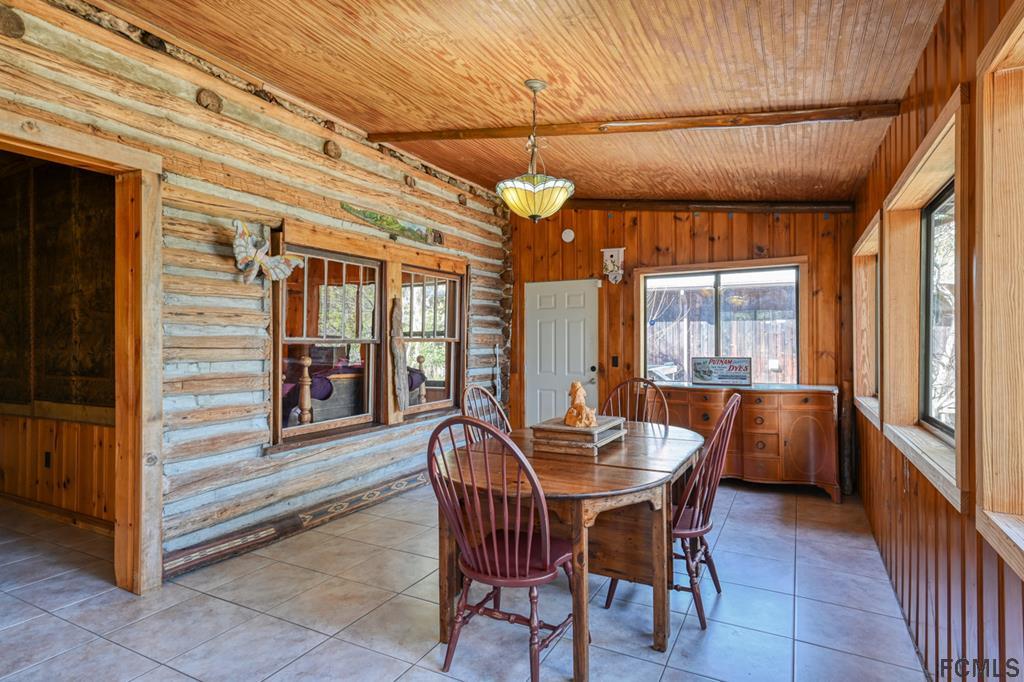 375-397 Southeast County Road Starke, FL 32091 - Photo 65 of 75 a dining room with furniture and window