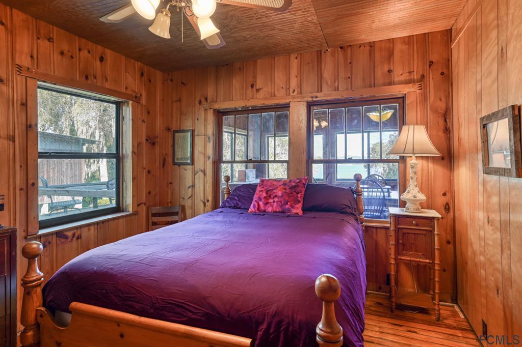 375-397 Southeast County Road Starke, FL 32091 - Photo 67 of 75 a bed room with a bed and a window
