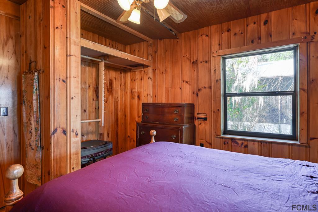 375-397 Southeast County Road Starke, FL 32091 - Photo 68 of 75 a bedroom with a bed dresser and a window