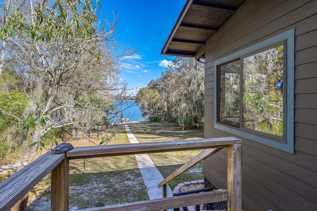 375-397 Southeast County Road Starke, FL 32091 - Photo 71 of 75 a view of a balcony with wooden floor