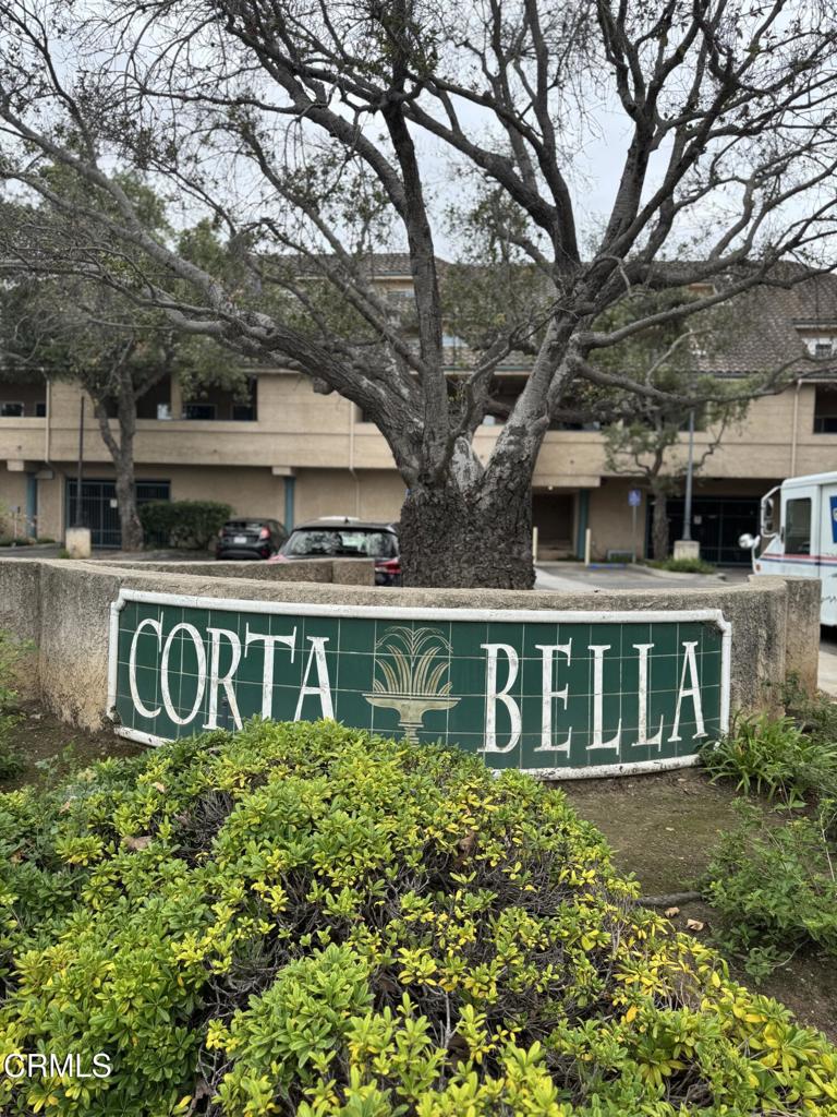 a sign that is sitting in front of a house