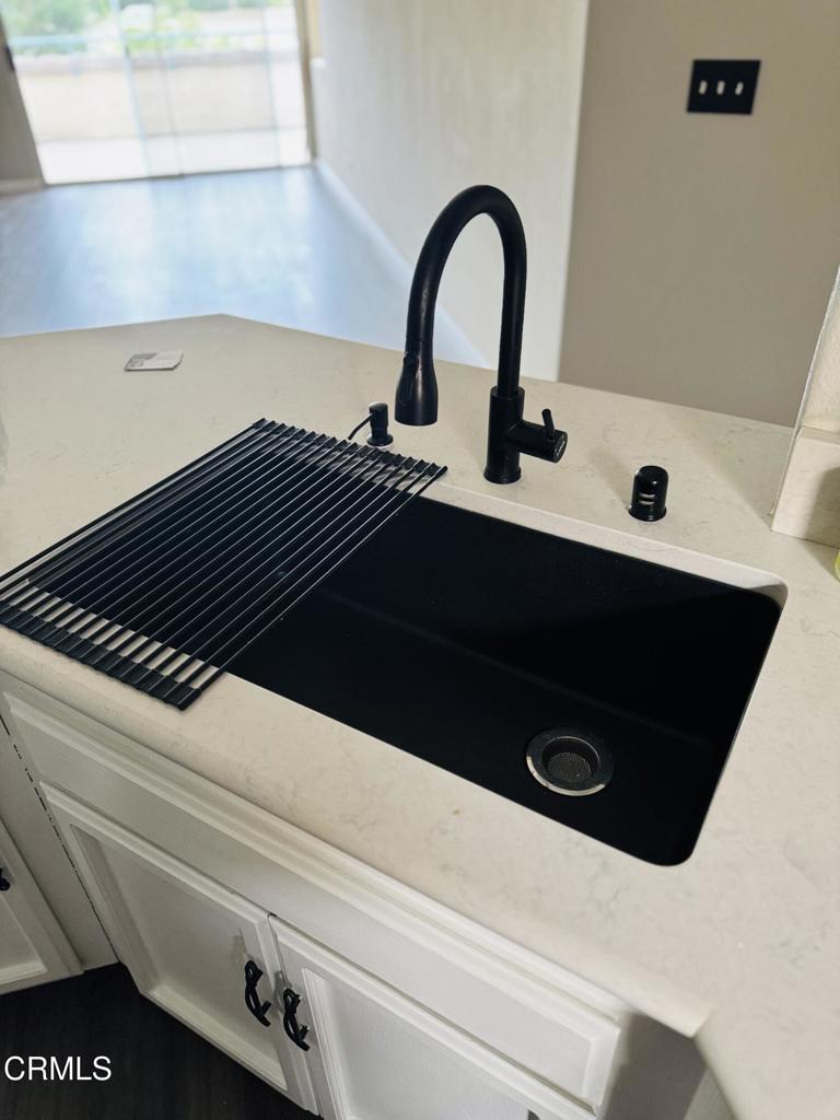 2742 Borchard Road Newbury Park, CA 91320 - Photo 19 of 51 a close view of a sink and dishwasher in a kitchen