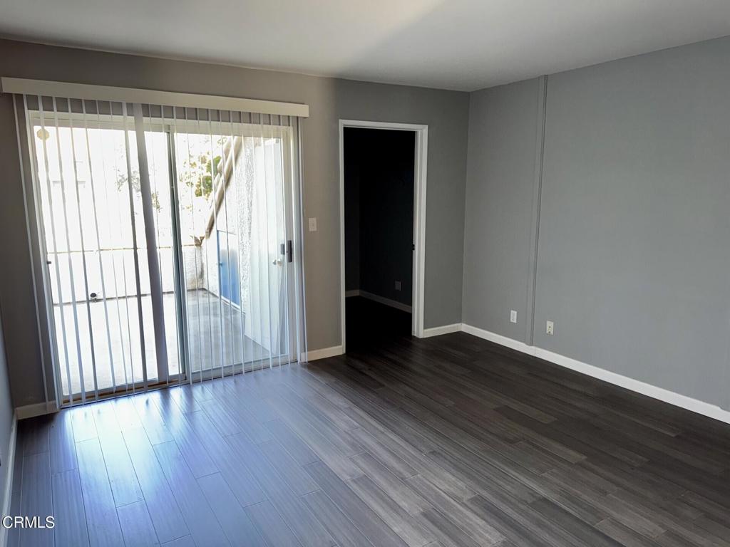 2742 Borchard Road Newbury Park, CA 91320 - Photo 28 of 51 an empty room with wooden floor and windows