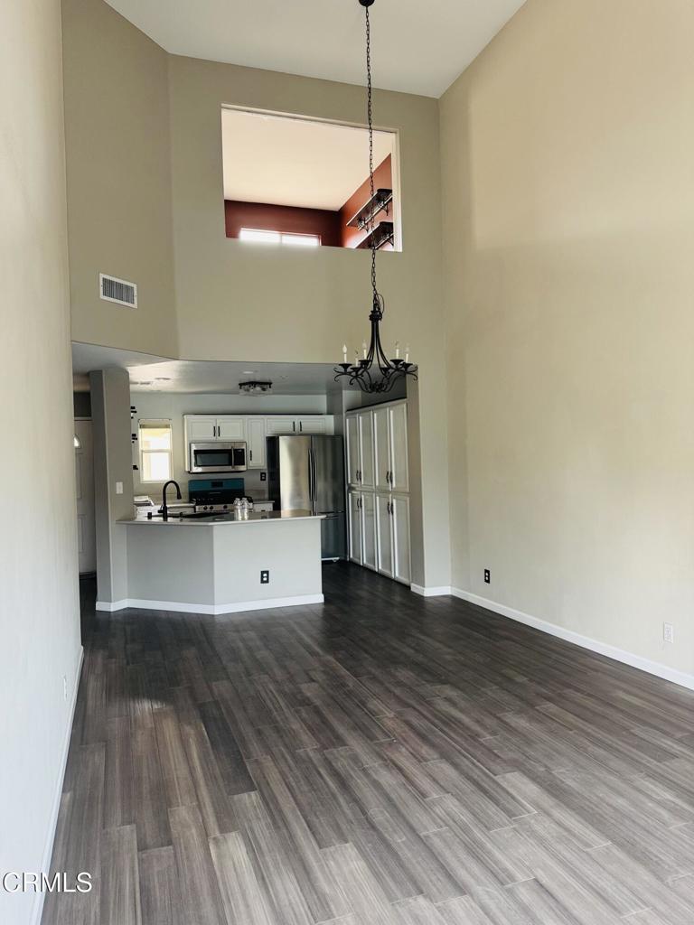 2742 Borchard Road Newbury Park, CA 91320 - Photo 9 of 51 a view of a kitchen with a sink and a floor to ceiling window
