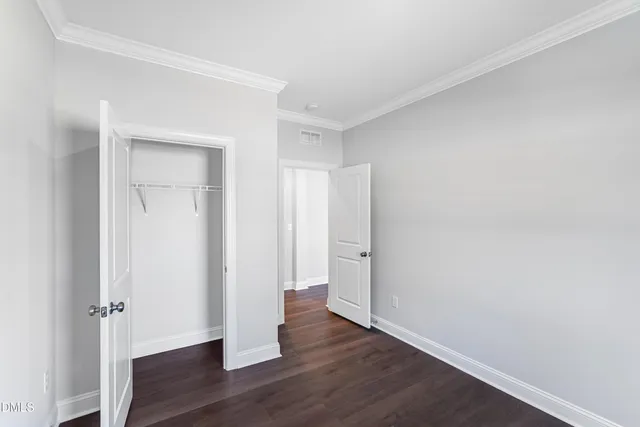 a empty closet with white paint