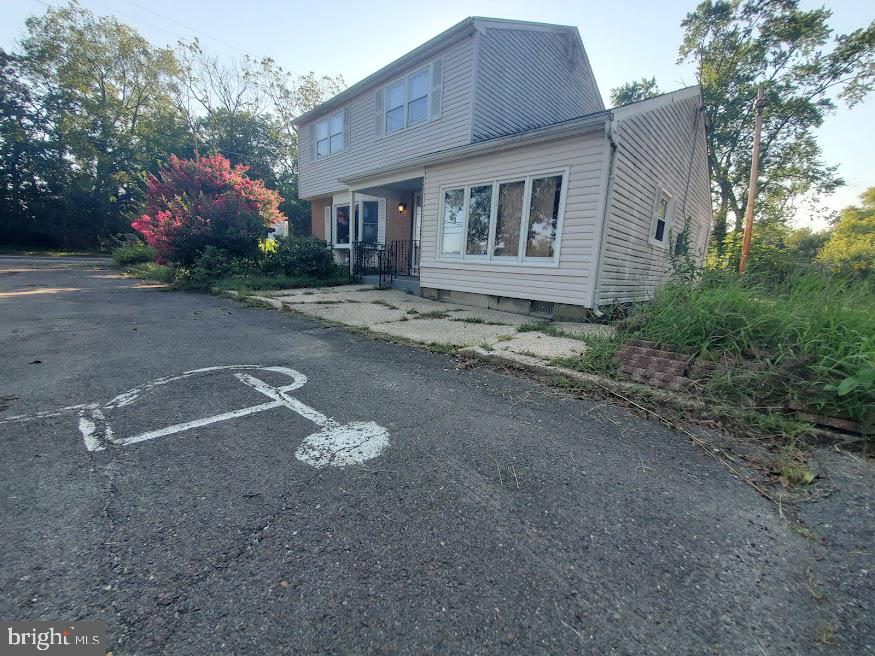 108 Juliustown Road Browns Mills, NJ 08015 - Photo 18 of 19 a front view of a house with a yard