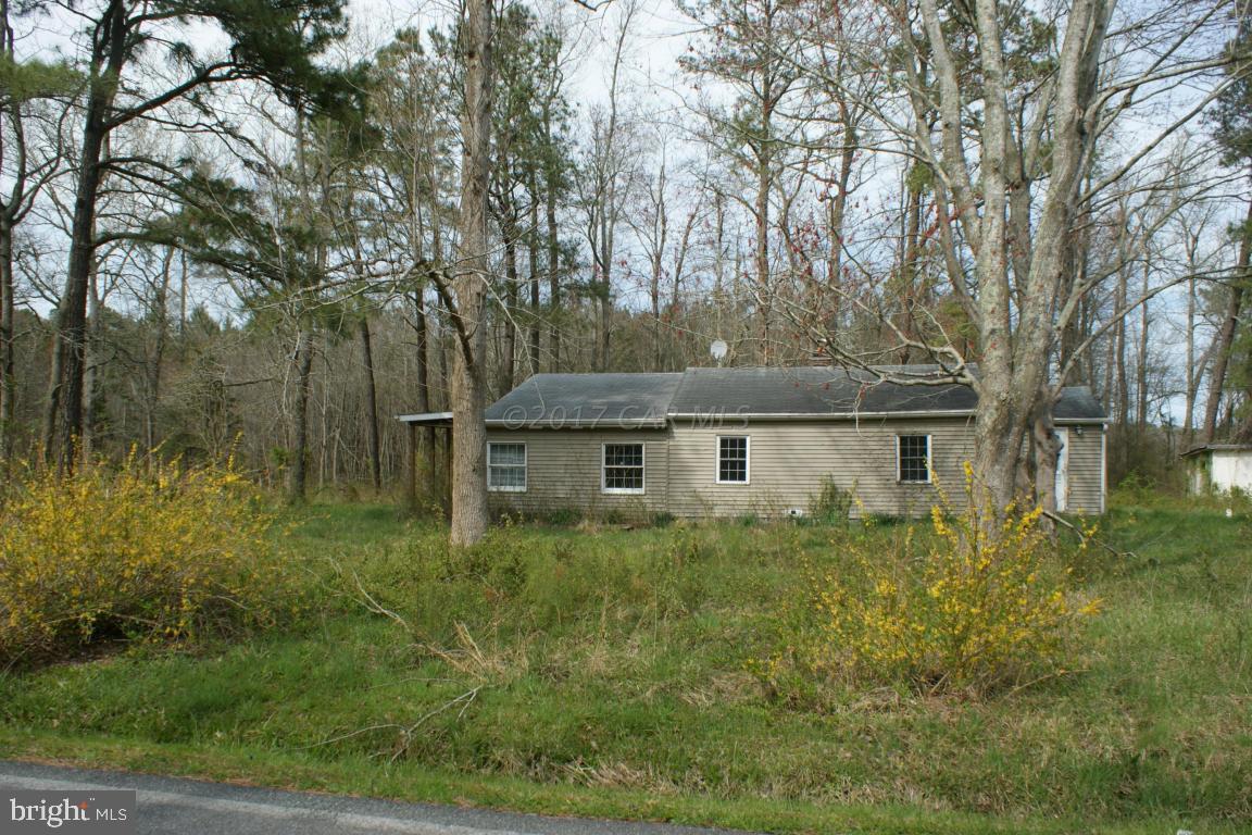 8517 Cedar Lane Road Berlin, MD 21811 - Photo 1 of 6 front view of a house with a yard