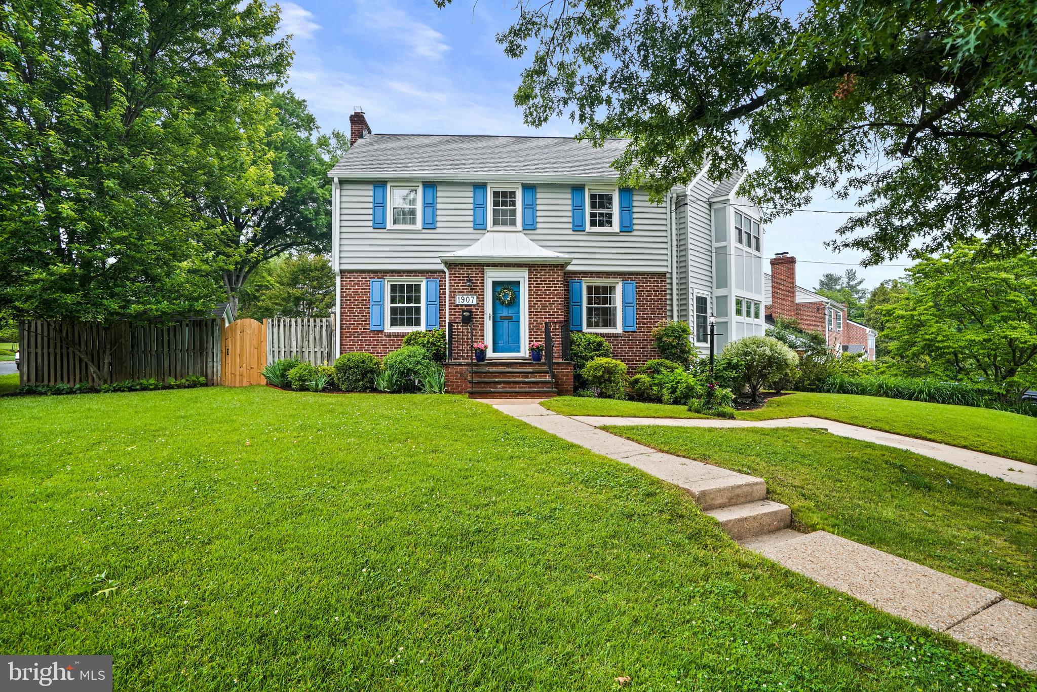 1907 Brisbane Street Silver Spring, MD 20902 - Photo 1 of 39 a front view of house with yard and green space