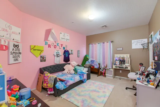 a bedroom with furniture and a bed