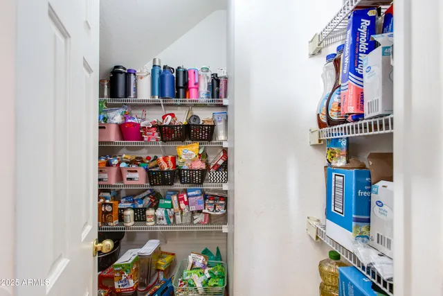 a room with lots of different colored cloths