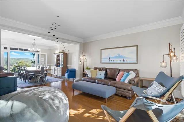 a view of a dining room with furniture window and outside view