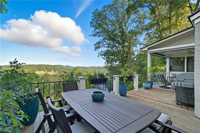 a bathroom with a double vanity sink a mirror and shower