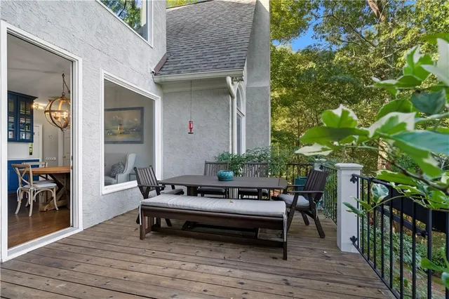 a bathroom with a sink a toilet and a shower