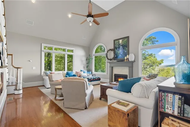 a bathroom with a sink vanity mirror and toilet