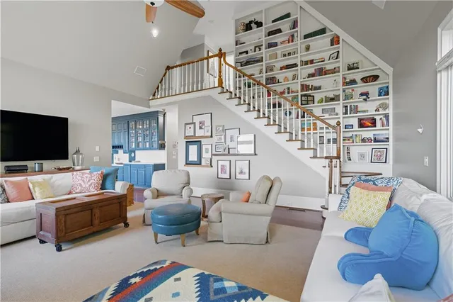 a bed room with a bed and a chandelier