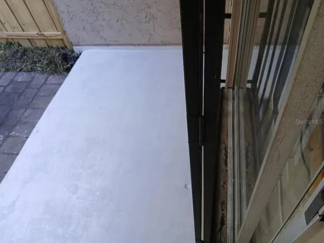 a view of a house with a street