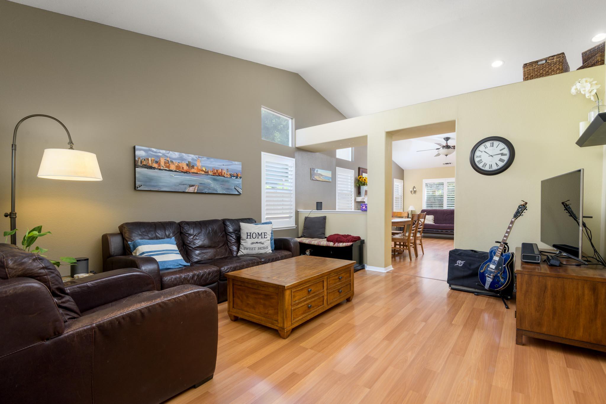 128 Gerard Drive Goleta, CA 93117 - Photo 2 of 20 a living room with furniture and a flat screen tv