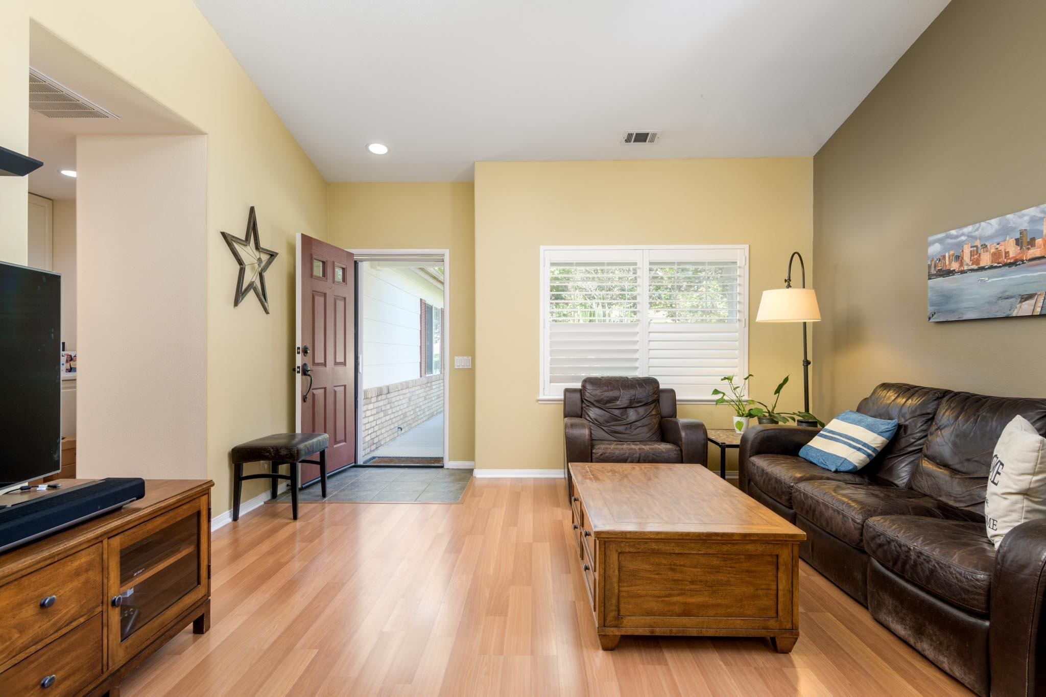 128 Gerard Drive Goleta, CA 93117 - Photo 6 of 20 a living room with furniture and a flat screen tv