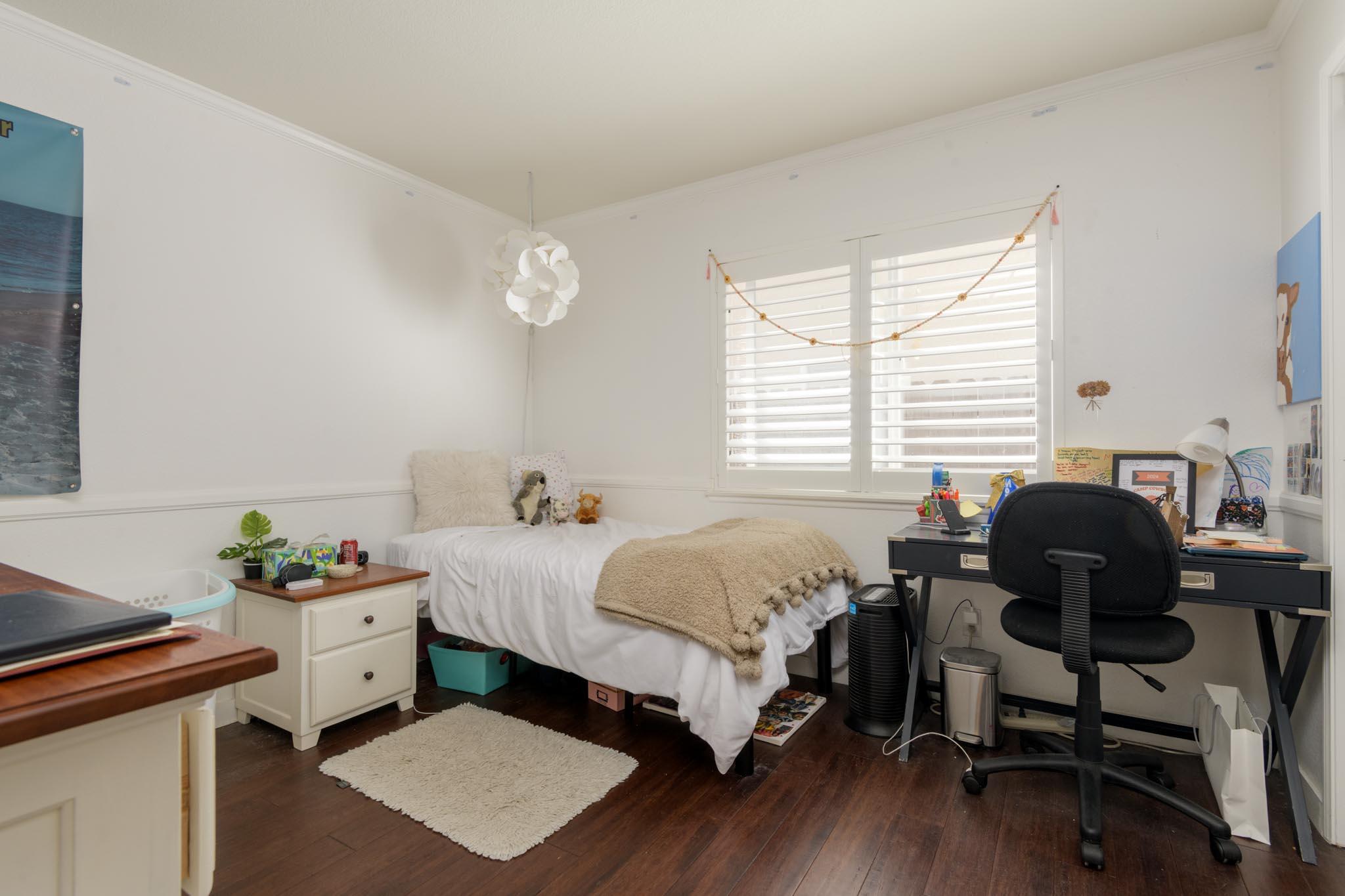128 Gerard Drive Goleta, CA 93117 - Photo 10 of 20 a bedroom with a bed and a desk