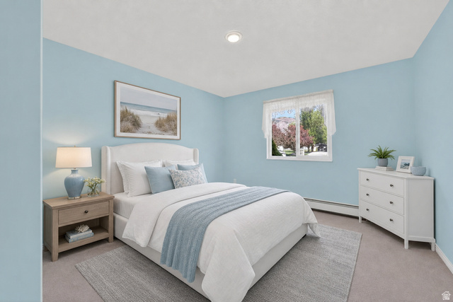 38 Valarie Street Morgan, UT 84050 - Photo 31 of 51 Virtual staging included to showcase room potential. Bedroom featuring light blue walls and neutral carpeting