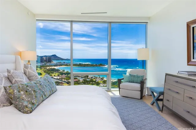a bathroom with a double vanity sink mirror and bathtub