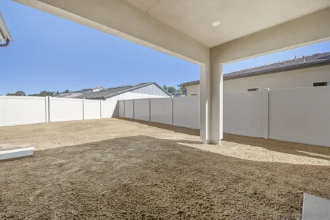 a view of a backyard of a house