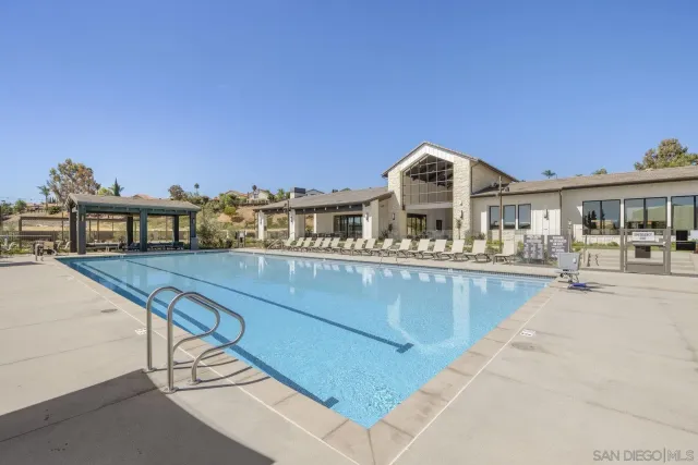 a view of a house with a swimming pool