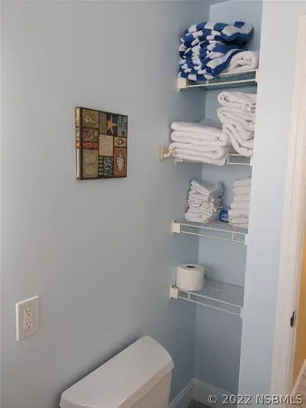 a view of bathroom with bathtub and shower