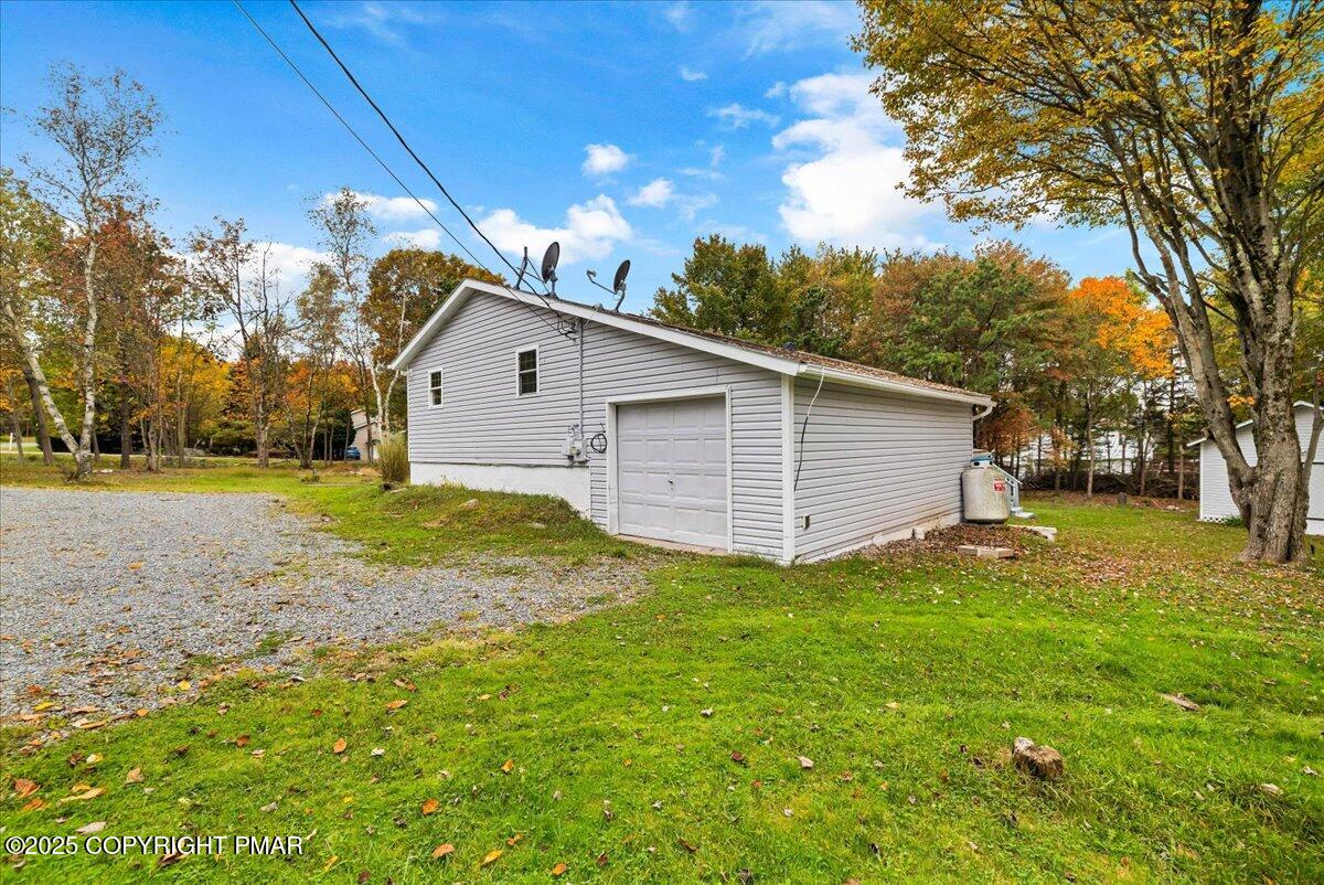 1456 Allegheny Drive Blakeslee, PA 18610 - Photo 70 of 94 a view of a backyard with large tree