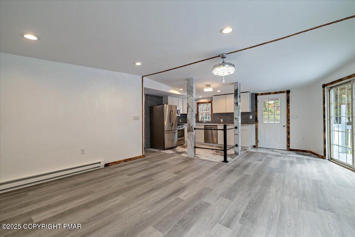 1456 Allegheny Drive Blakeslee, PA 18610 - Photo 76 of 94 a view of a room with gym equipment and windows