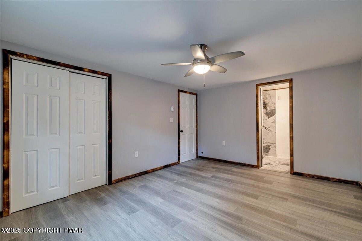 1456 Allegheny Drive Blakeslee, PA 18610 - Photo 82 of 94 wooden floor in an empty room with a window