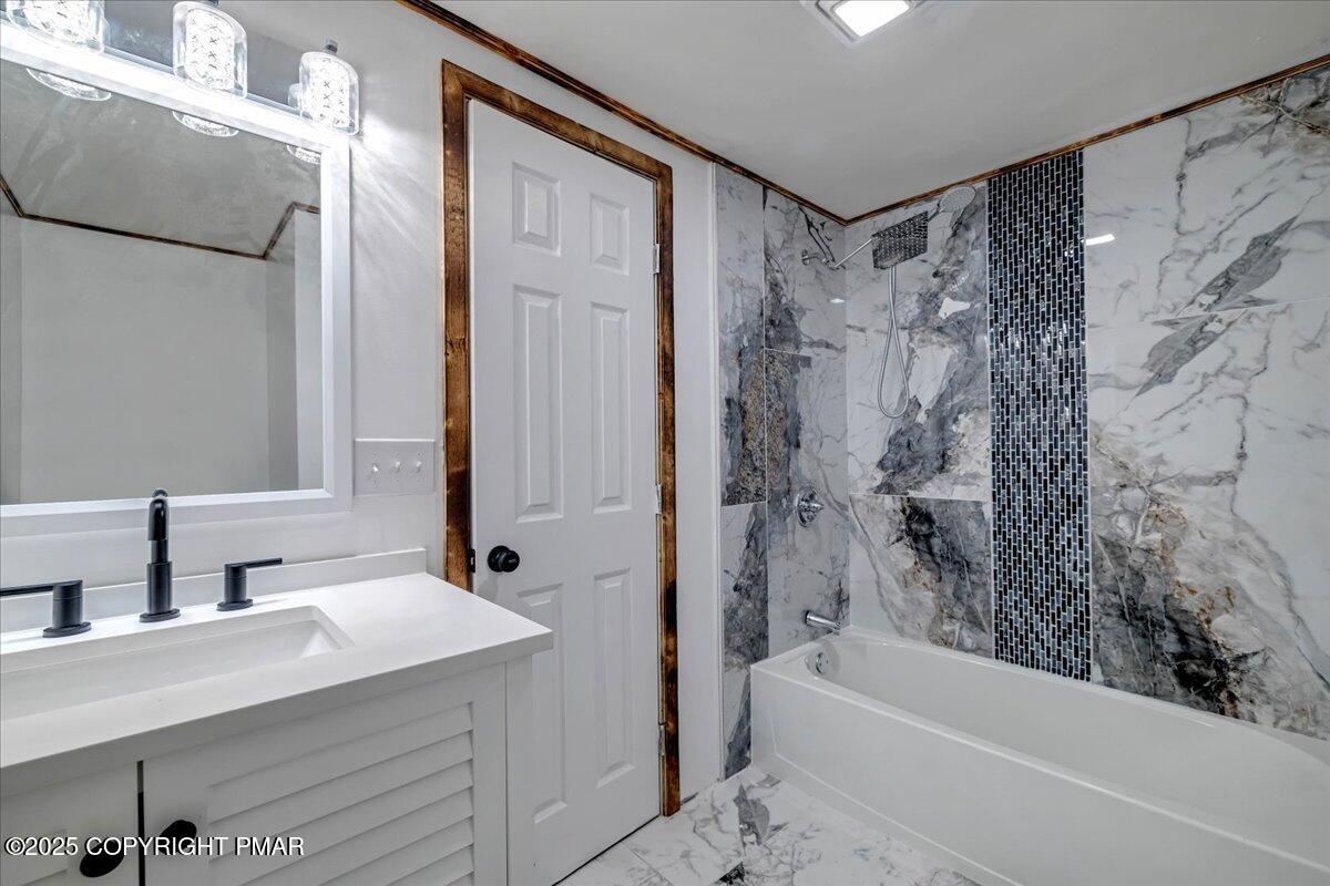 1456 Allegheny Drive Blakeslee, PA 18610 - Photo 83 of 94 a bathroom with a bathtub and a sink