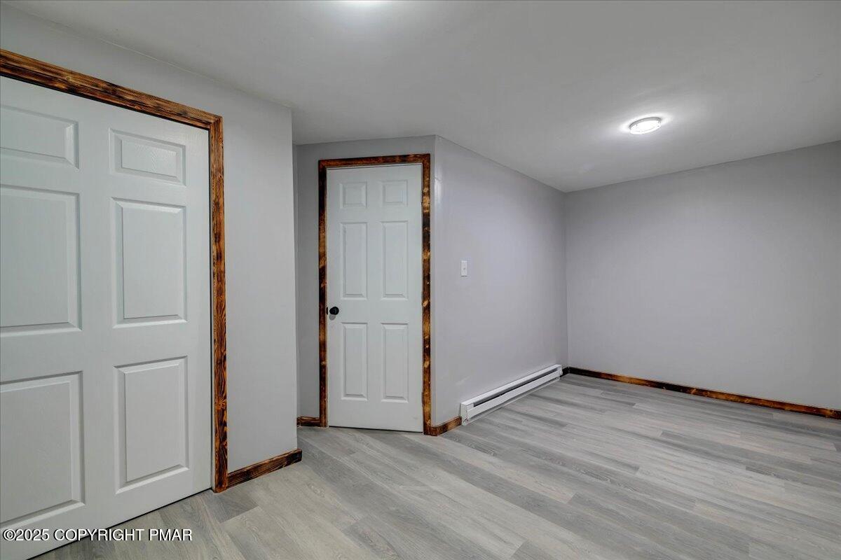 1456 Allegheny Drive Blakeslee, PA 18610 - Photo 90 of 94 an empty room with wooden floor and closet