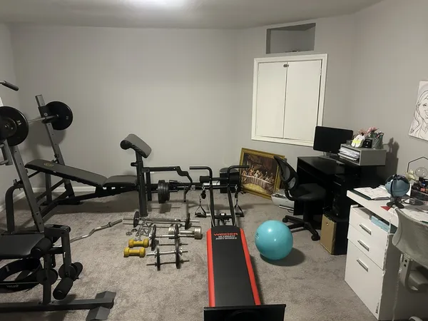 a view of a room with gym equipment