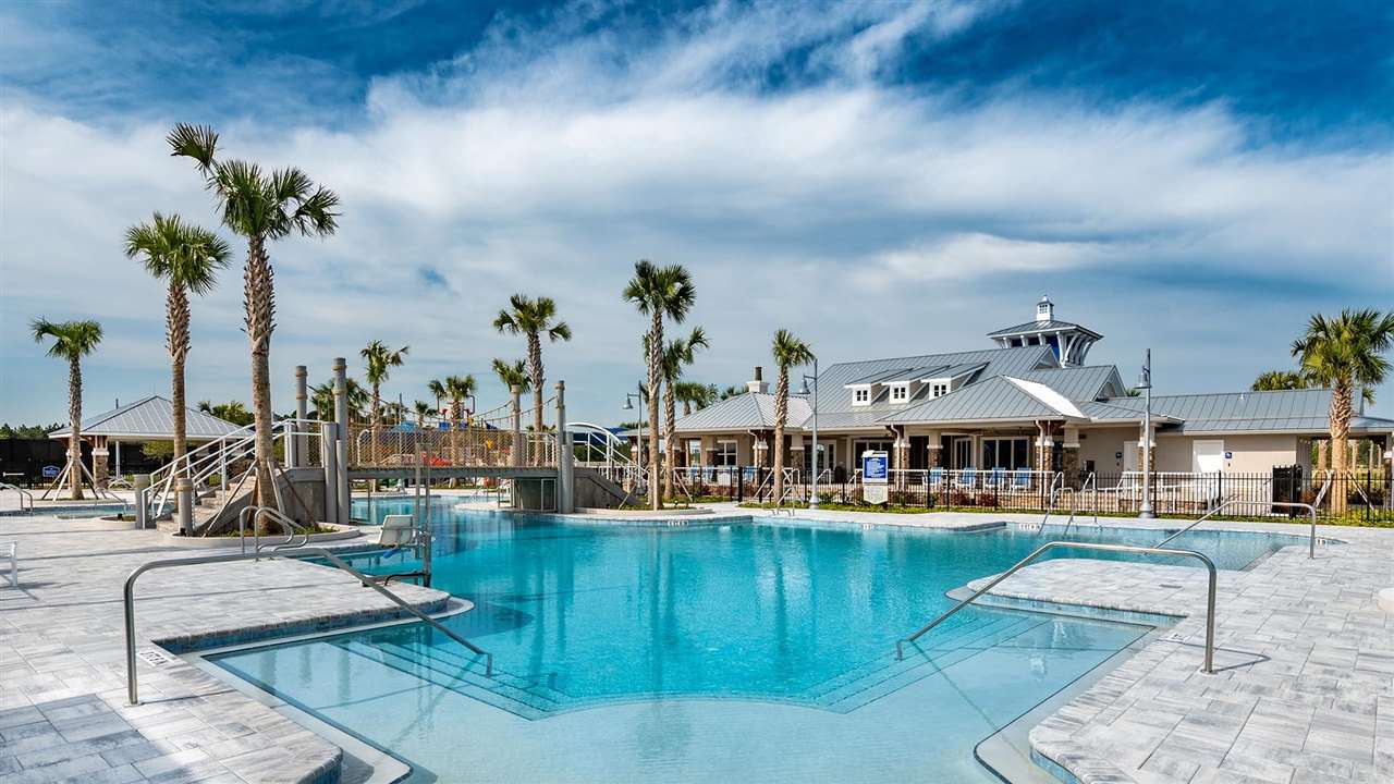 181 Thistleton Way St. Augustine, FL 32092 - Photo 14 of 28 an aerial view of a swimming pool with outdoor seating