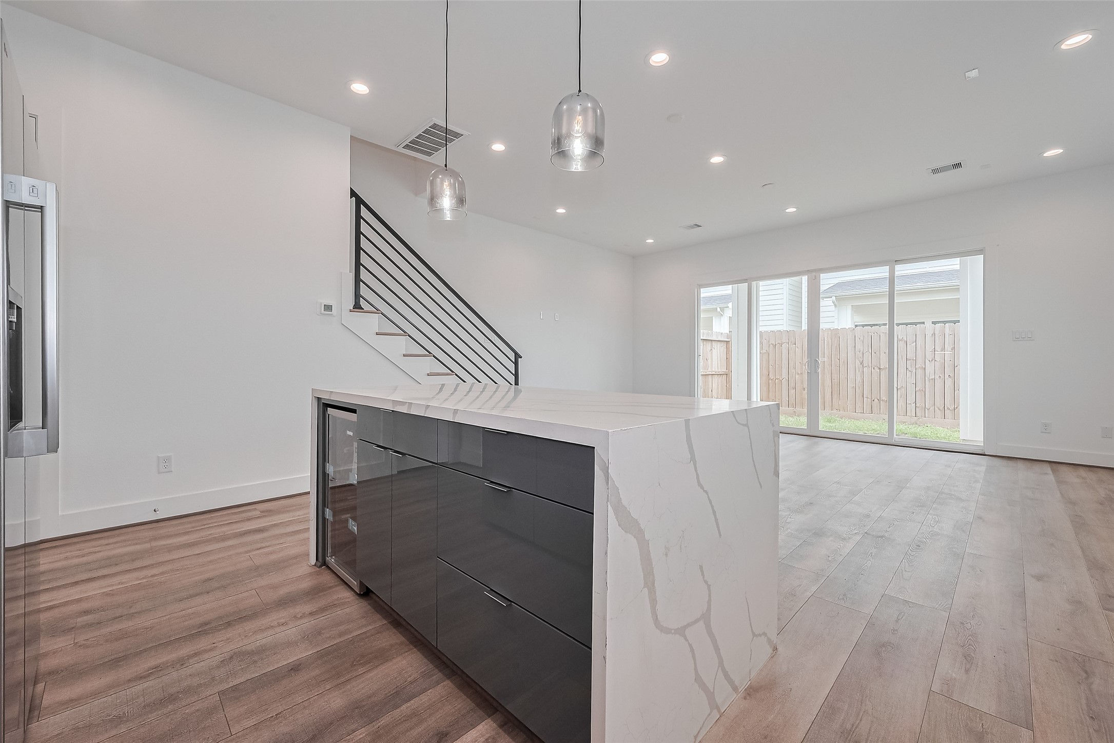 3510 Hadley Street Houston, TX 77004 - Photo 17 of 48 a view of an empty room with wooden floor and a window
