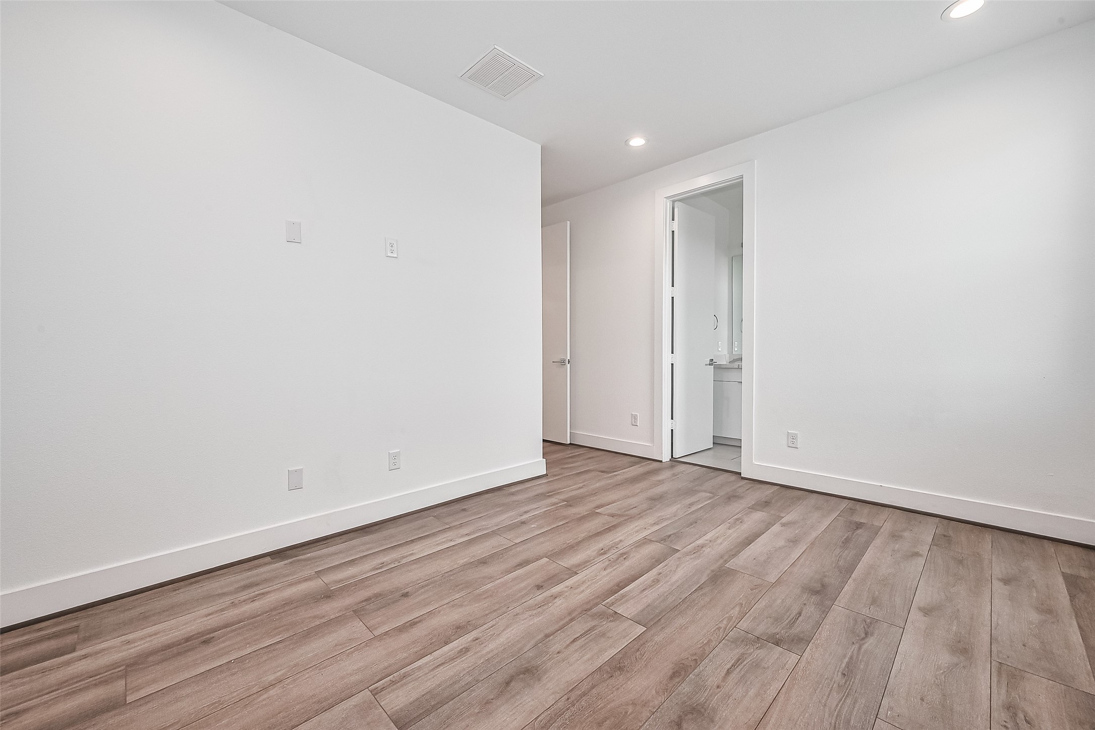 3510 Hadley Street Houston, TX 77004 - Photo 27 of 48 a view of an empty room with wooden floor