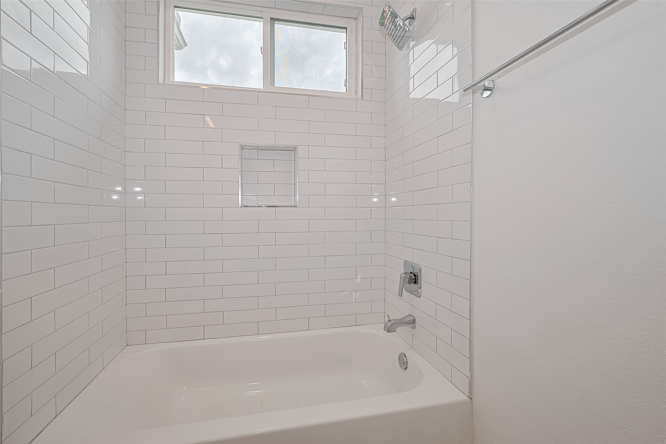 3510 Hadley Street Houston, TX 77004 - Photo 30 of 48 a close up of a bathtub curtain