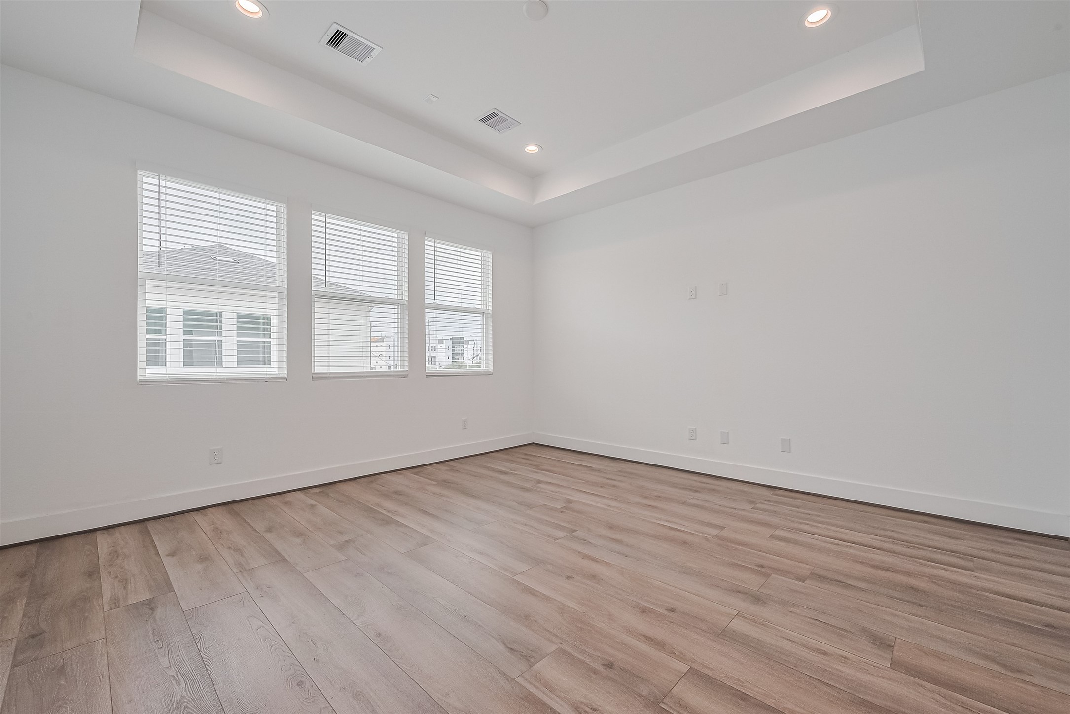 3510 Hadley Street Houston, TX 77004 - Photo 39 of 48 an empty room with wooden floor and windows