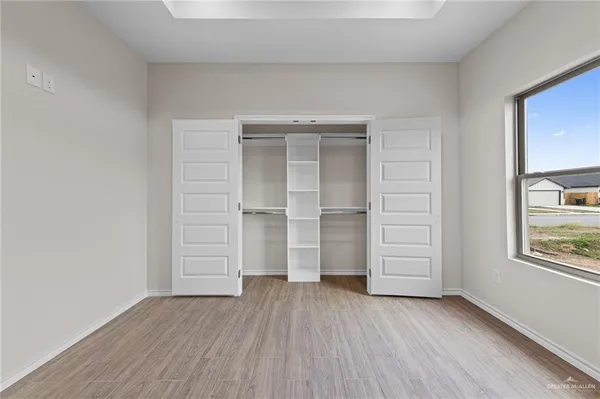 a view of an empty walk in closet