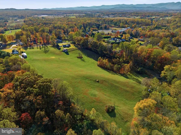 a view of a city with mountains in the background