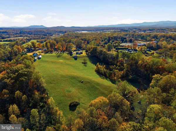a view of a city with mountains in the background
