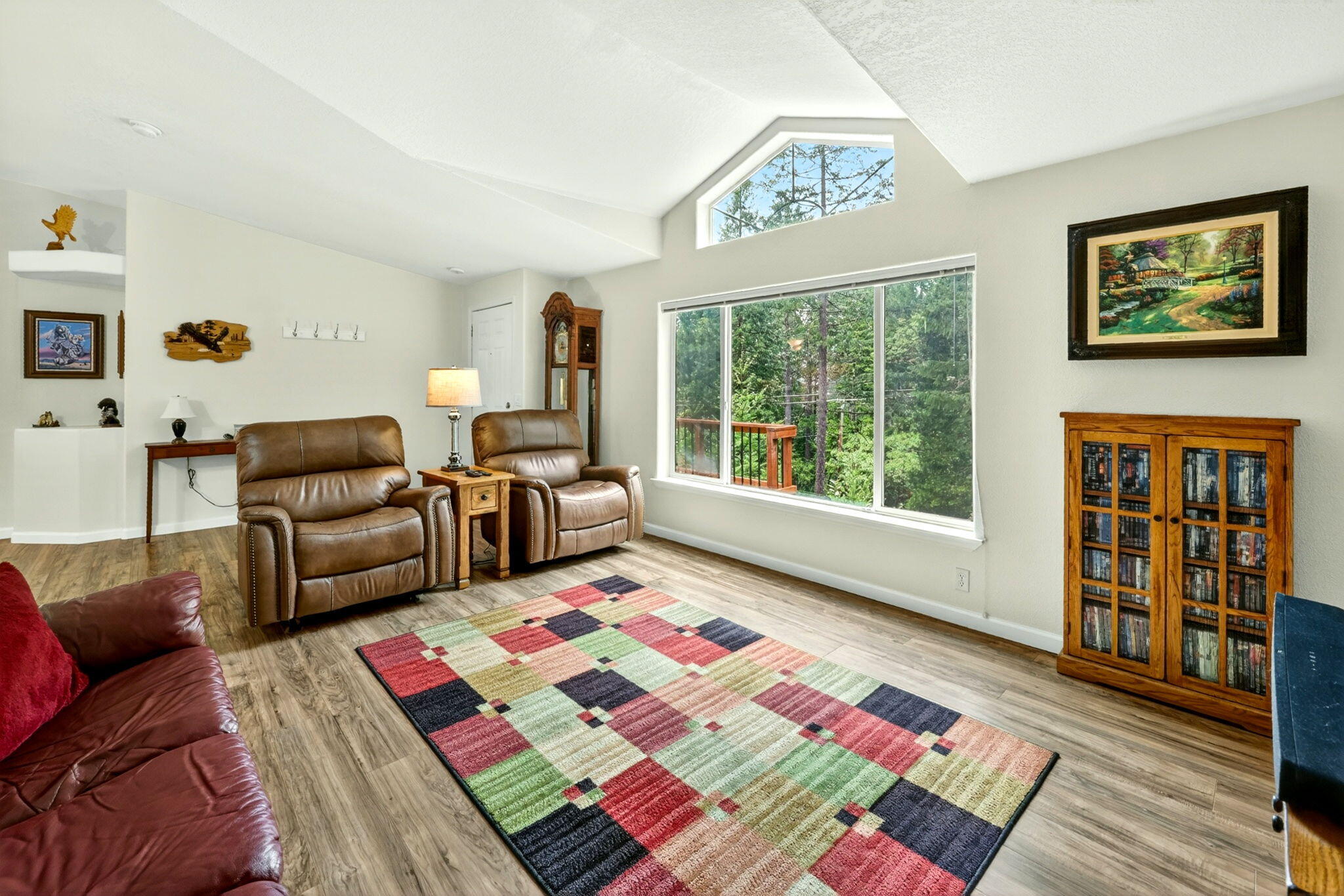 5445 Thompson Creek Road Selma, OR 97538 - Photo 8 of 57 a living room with furniture and a rug