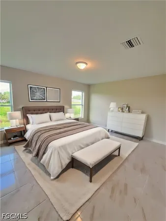 a bedroom with beds and a night stand