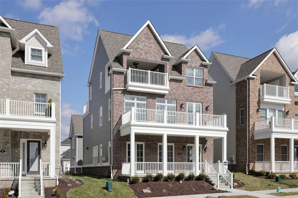 7 Carolina Avenue Oakmont, PA 15139 - Photo 1 of 24 a front view of a residential apartment building with a yard