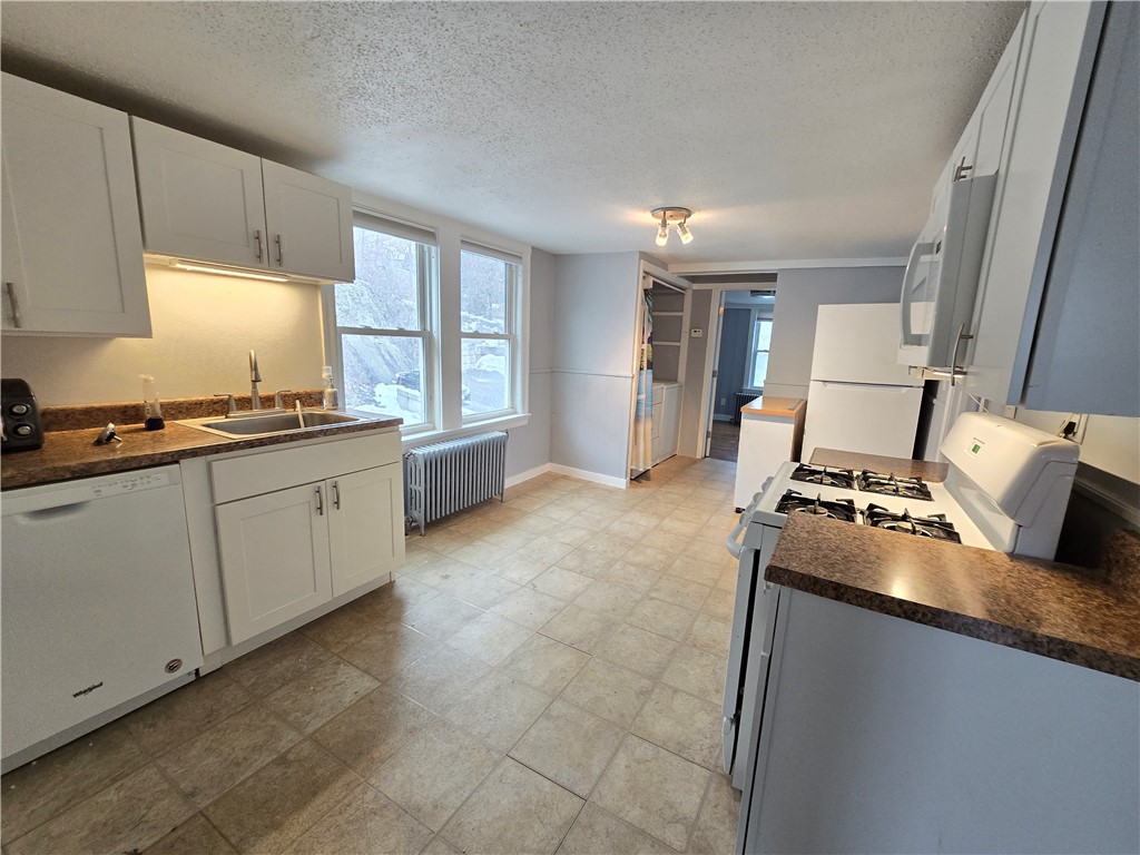 968 Elm Street, Unit 2 Woonsocket, RI 02895 - Photo 3 of 14 Eat in Kitchen with Gas Stove, Microwave & Dishwasher