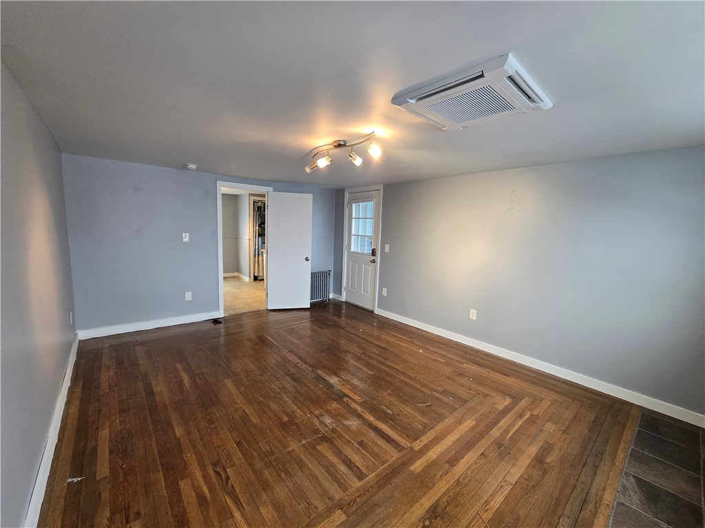 968 Elm Street, Unit 2 Woonsocket, RI 02895 - Photo 7 of 14 Large Master Bedroom with Porch off to Side